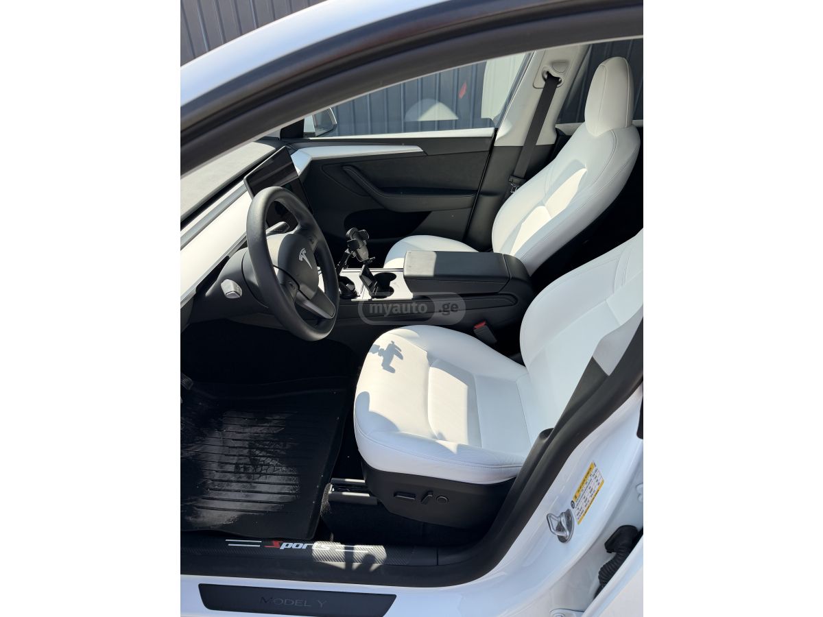 Tesla Model Y - фото 7