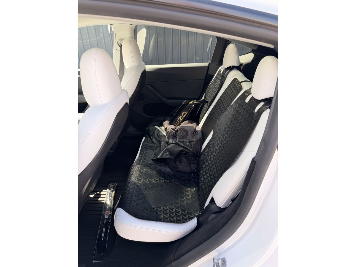 Tesla Model Y - фото 8