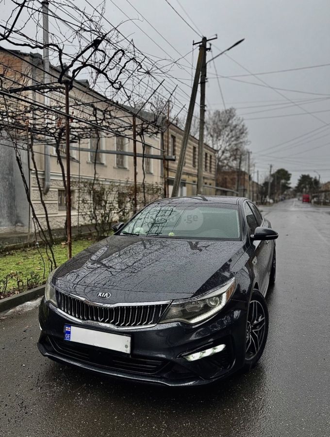Kia Optima - фото 1