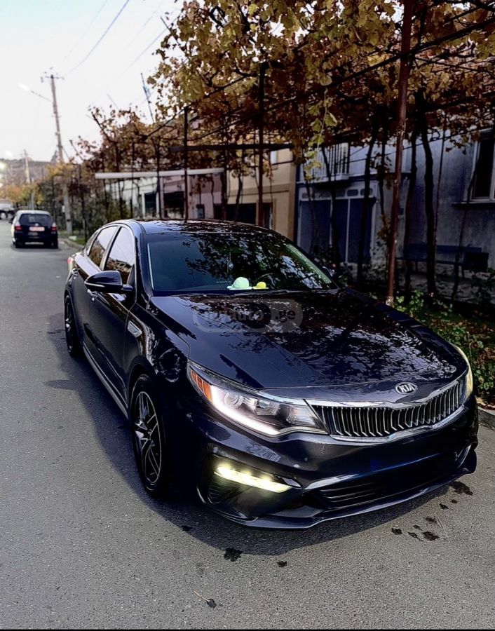 Kia Optima - фото 10