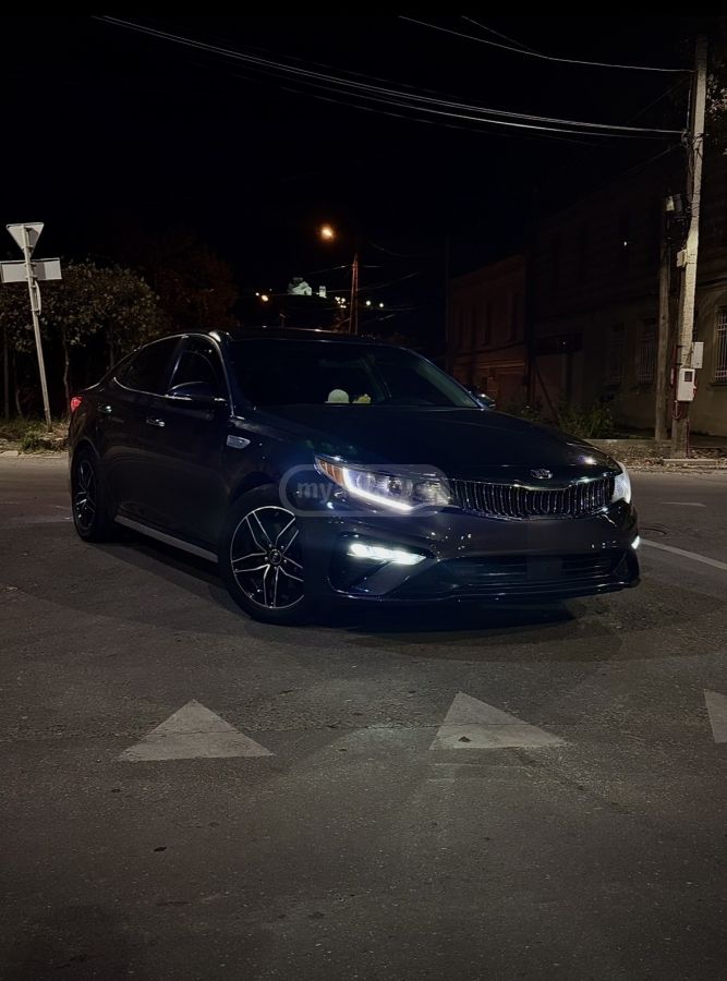 Kia Optima - фото 11