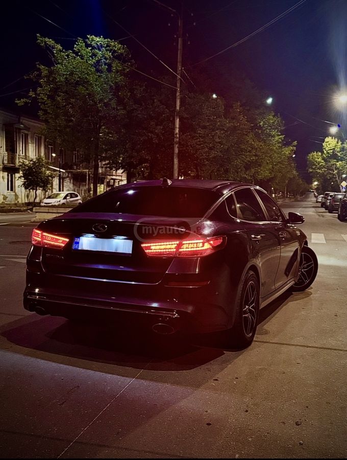 Kia Optima - фото 12