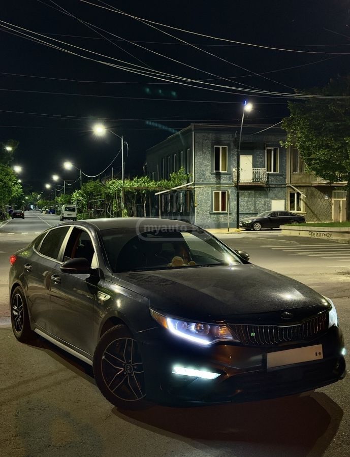 Kia Optima - фото 13