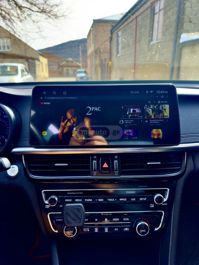 Kia Optima - фото 5