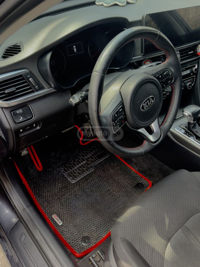 Kia Optima - фото 6