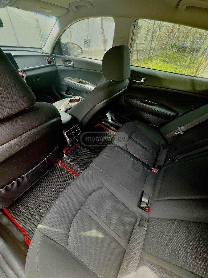 Kia Optima - фото 7