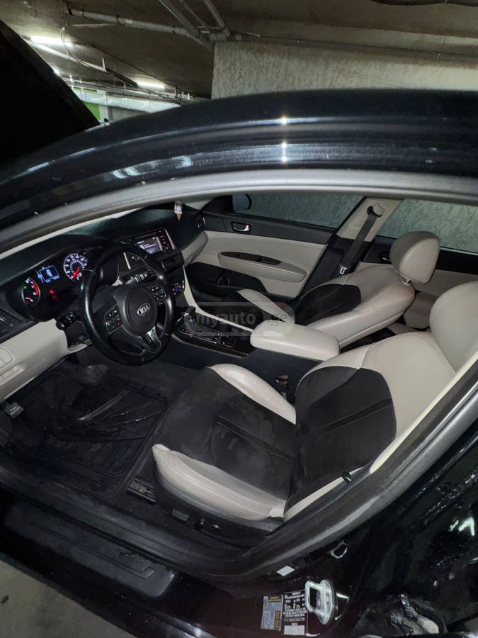 Kia Optima - фото 6