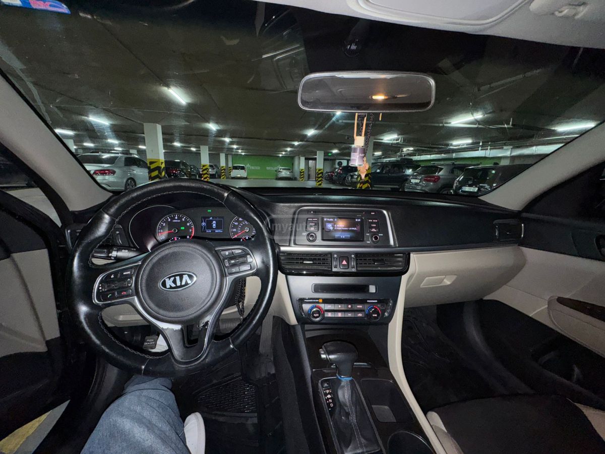 Kia Optima - фото 7