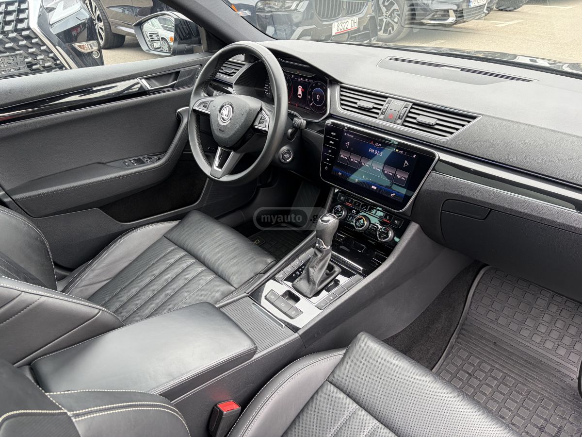Skoda Superb - фото 8