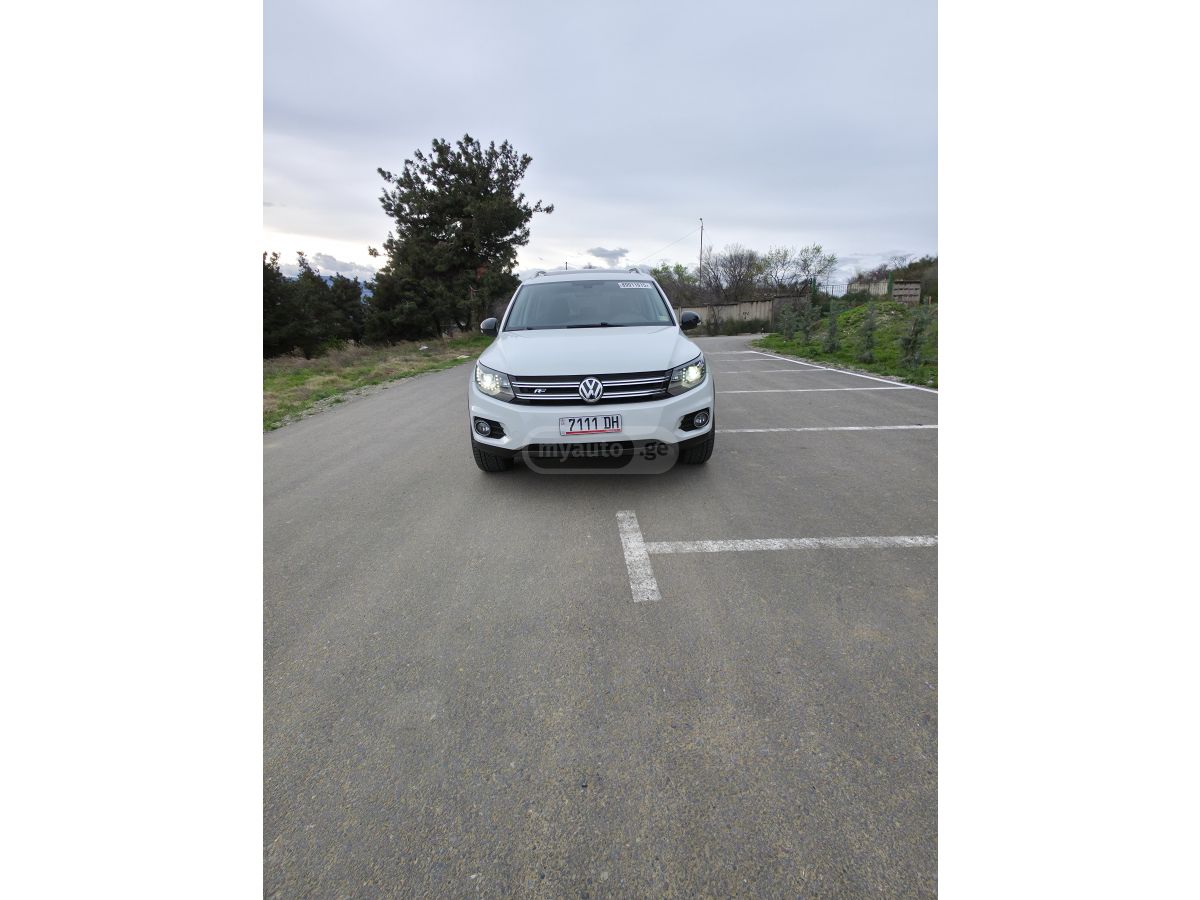 Volkswagen Tiguan - фото 1