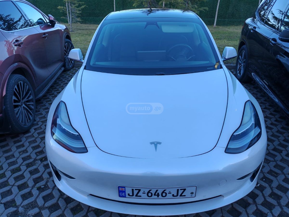 Tesla Model 3 - фото 8