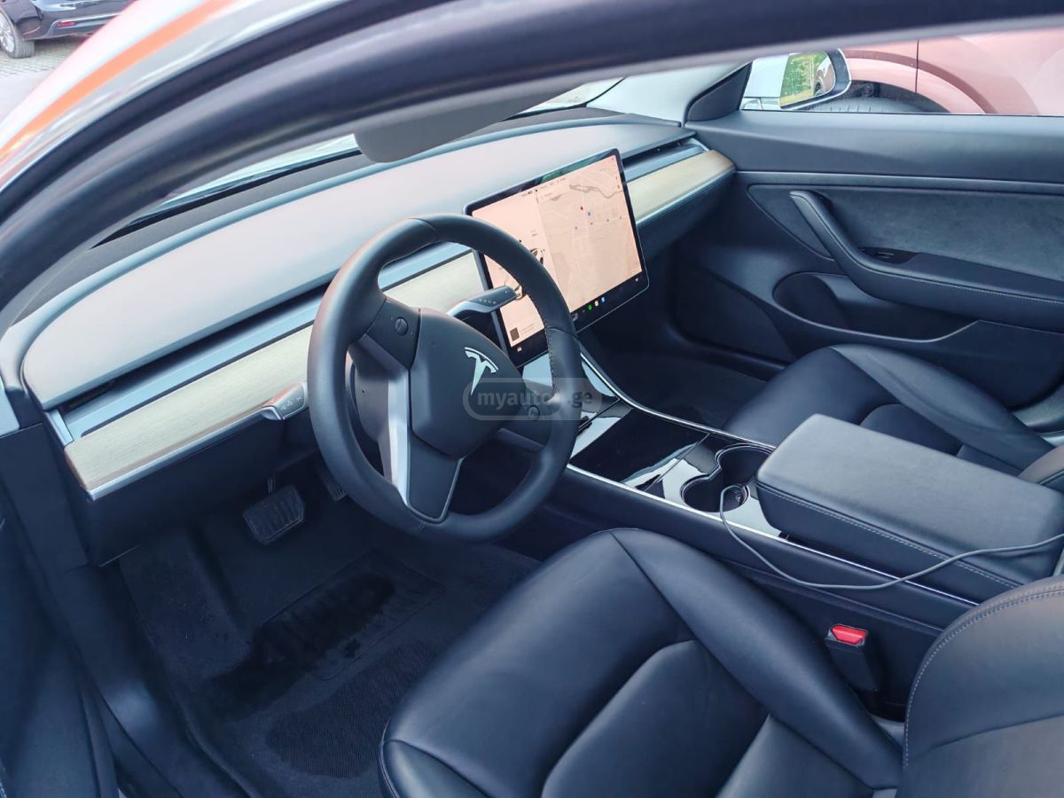 Tesla Model 3 - фото 9