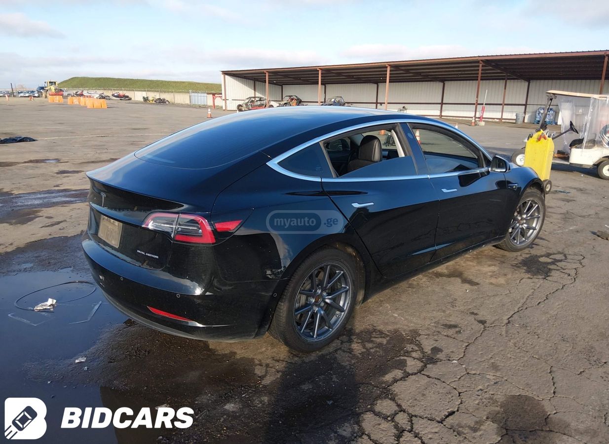 Tesla Model 3 - фото 4