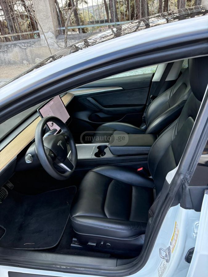 Tesla Model 3 - фото 7