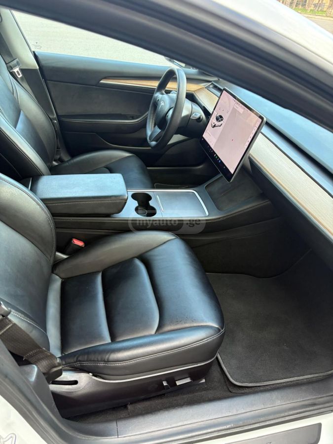 Tesla Model 3 - фото 9