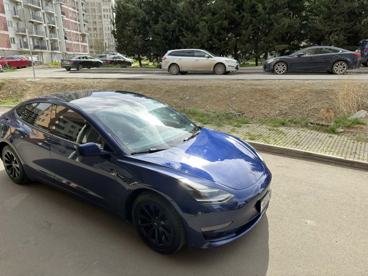 Tesla Model 3 - фото 11