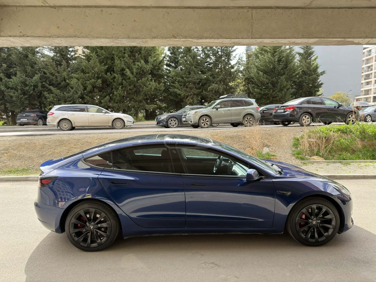 Tesla Model 3 - фото 8