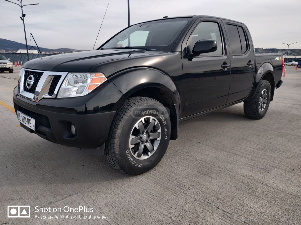 Nissan Frontier - фото 1