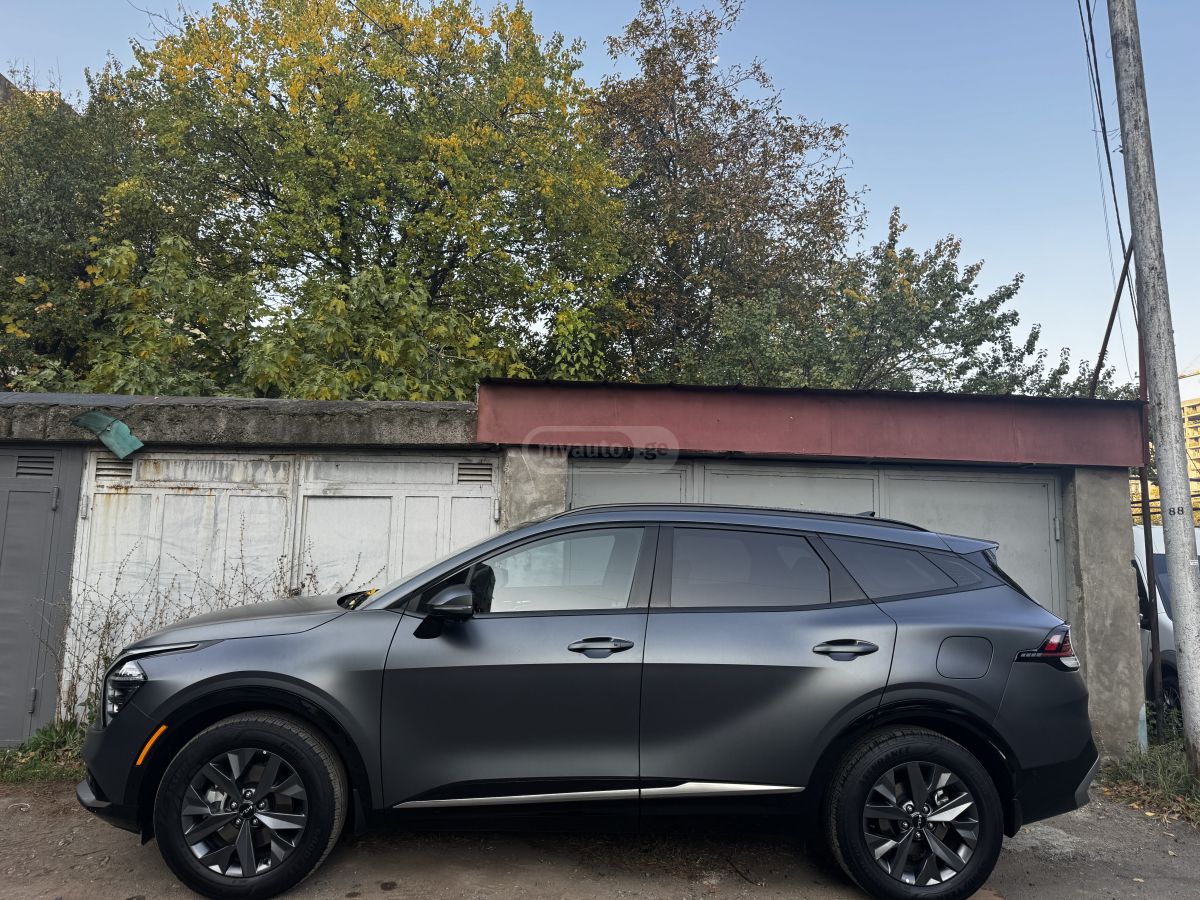 Kia Sportage - фото 1