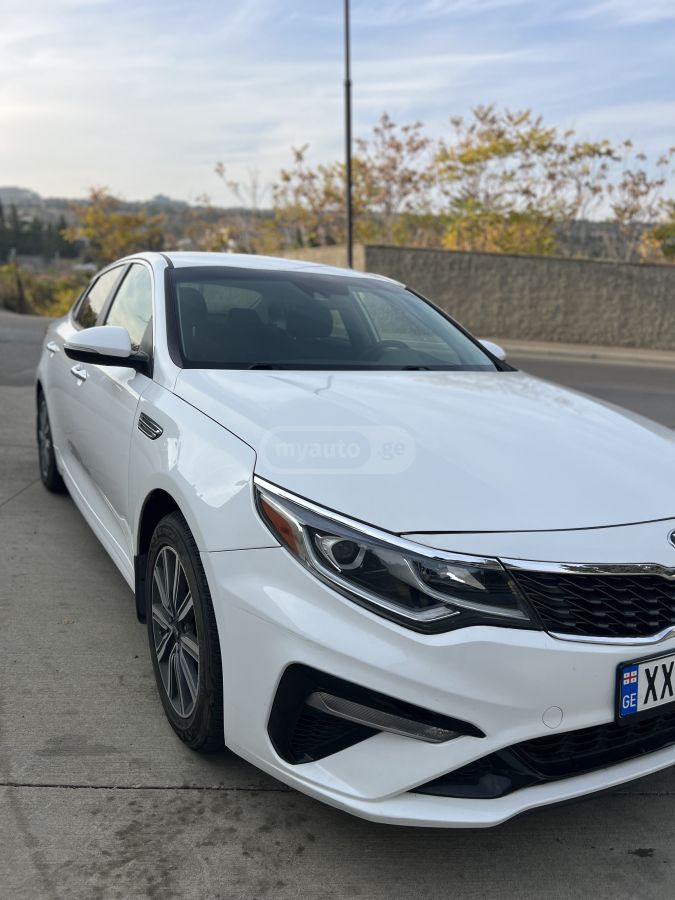 Kia Optima - фото 1