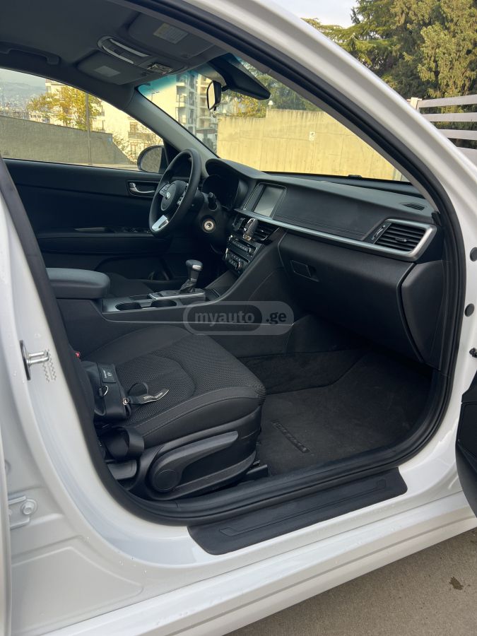 Kia Optima - фото 10