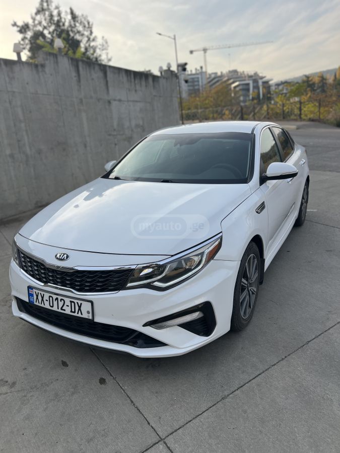 Kia Optima - фото 11