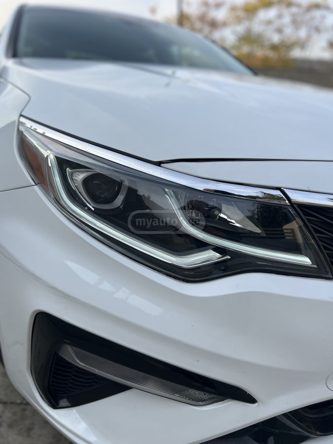 Kia Optima - фото 12