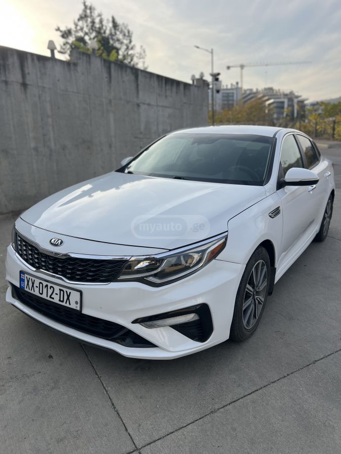 Kia Optima - фото 14