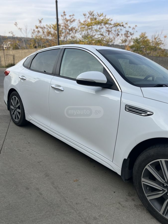 Kia Optima - фото 6