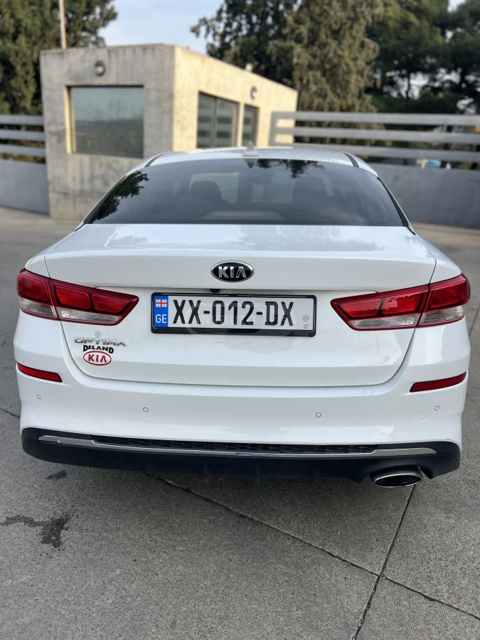 Kia Optima - фото 9