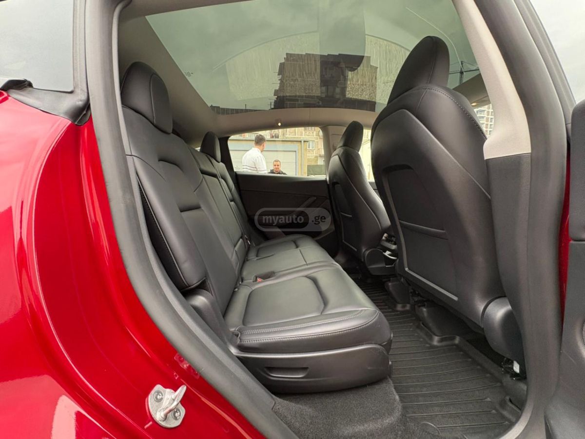 Tesla Model Y - фото 13