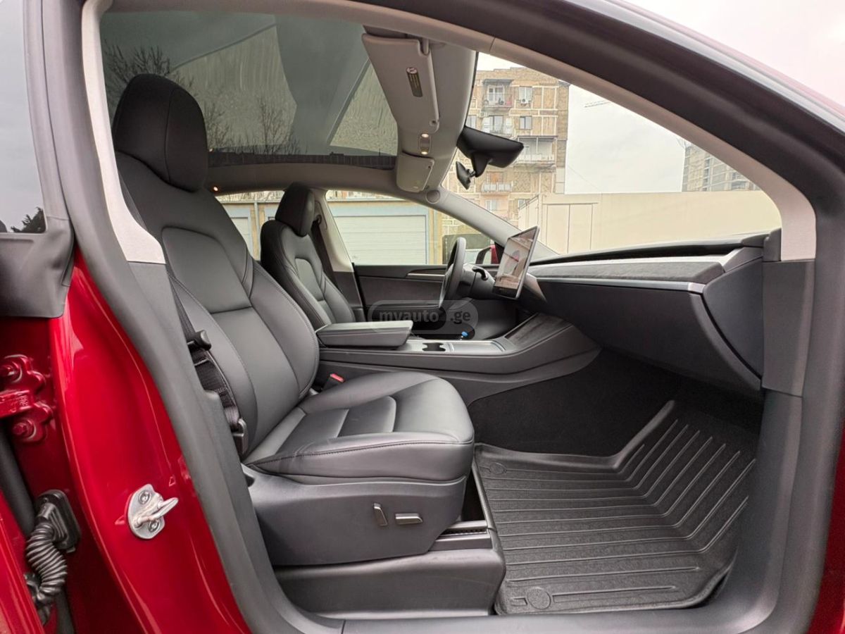 Tesla Model Y - фото 9