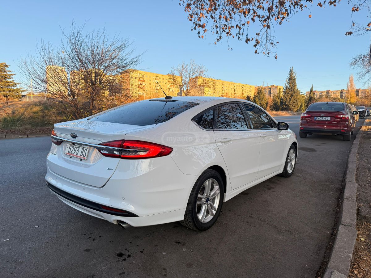 Ford Fusion - фото 7