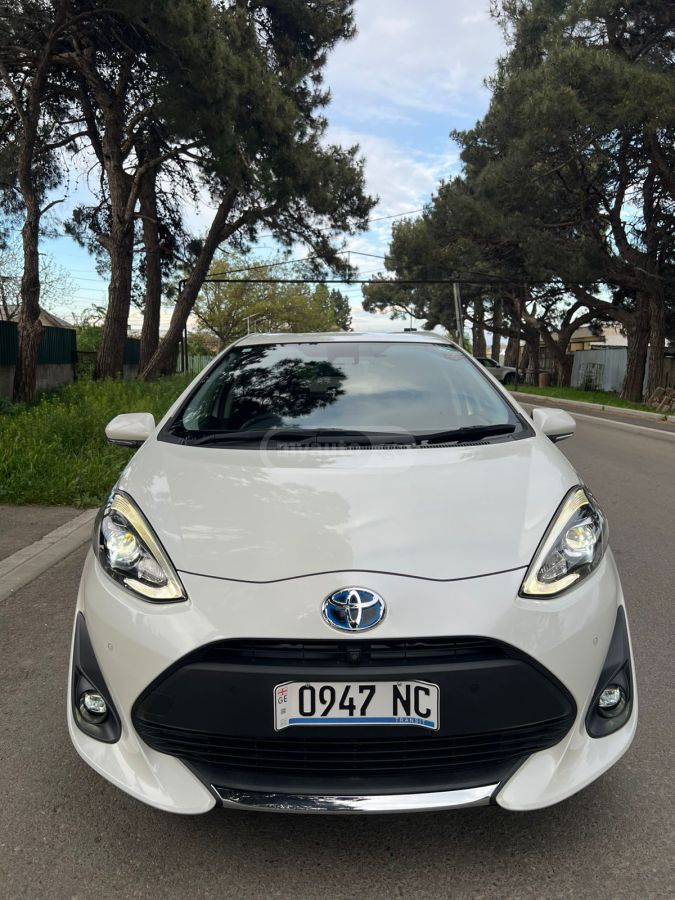 Toyota Aqua - фото 5