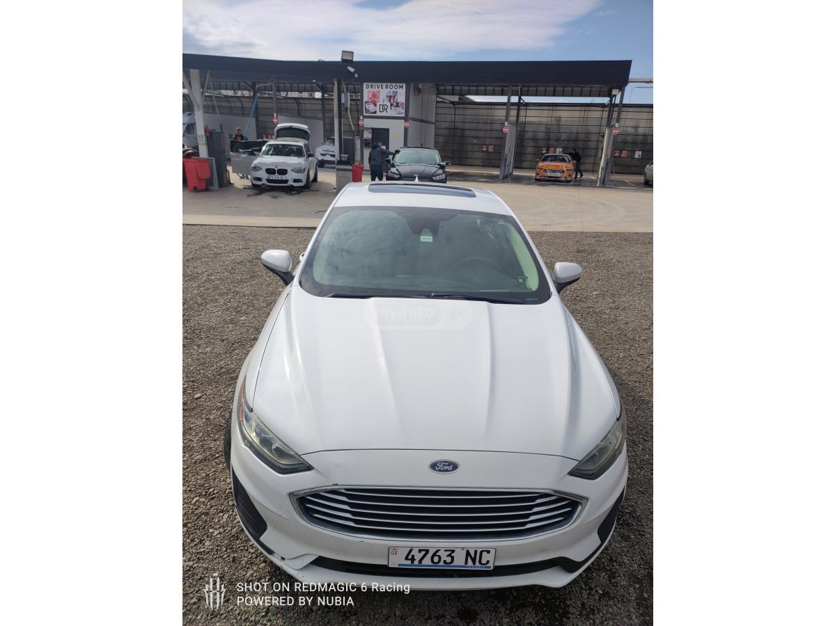 Ford Fusion - фото 10