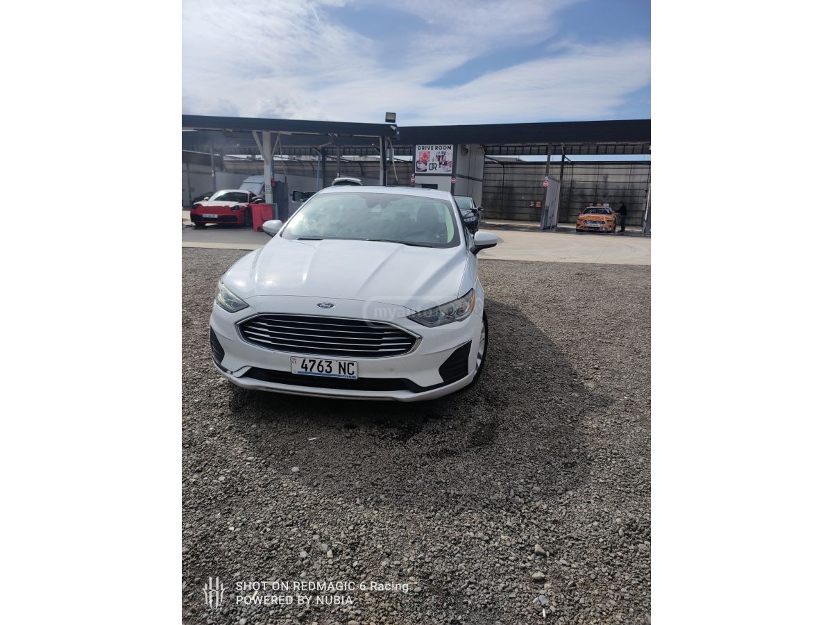 Ford Fusion - фото 11