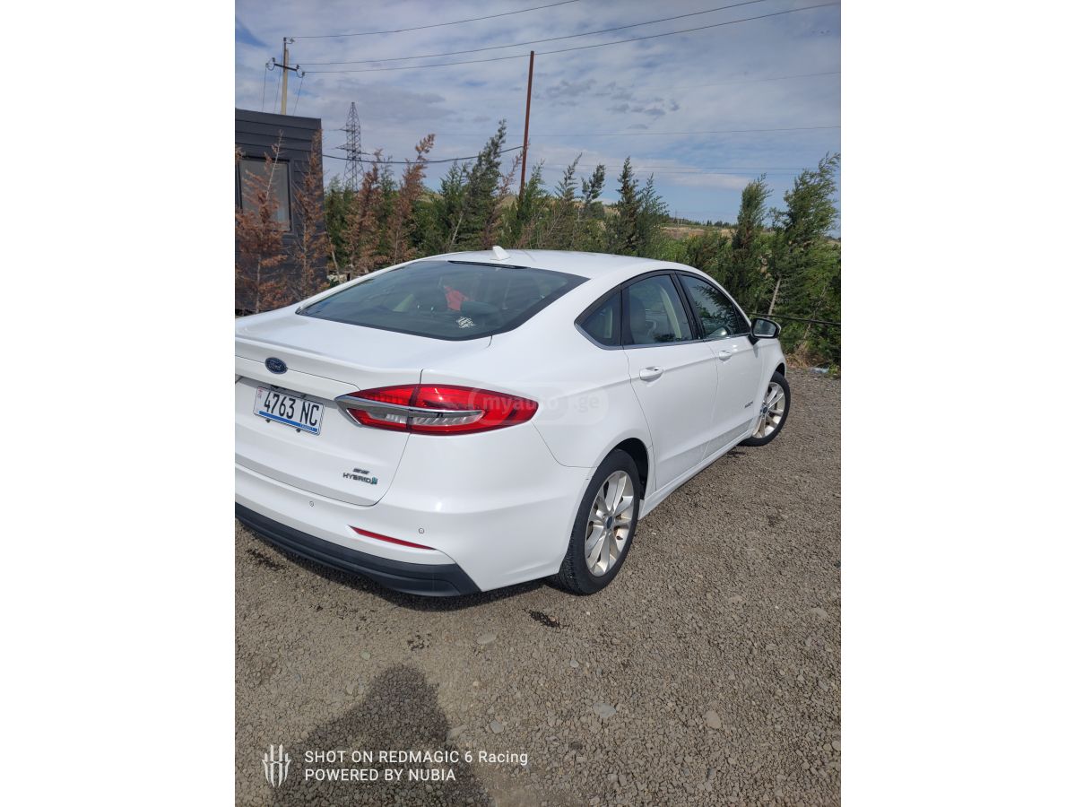 Ford Fusion - фото 7