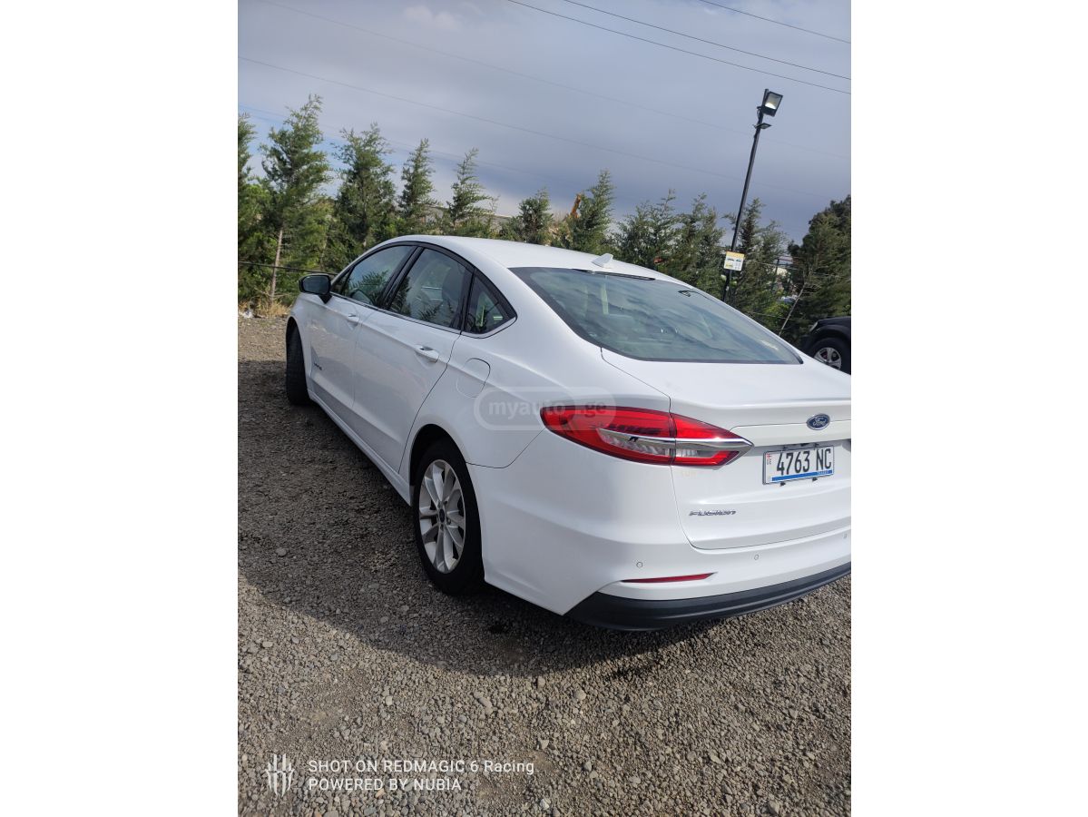 Ford Fusion - фото 9