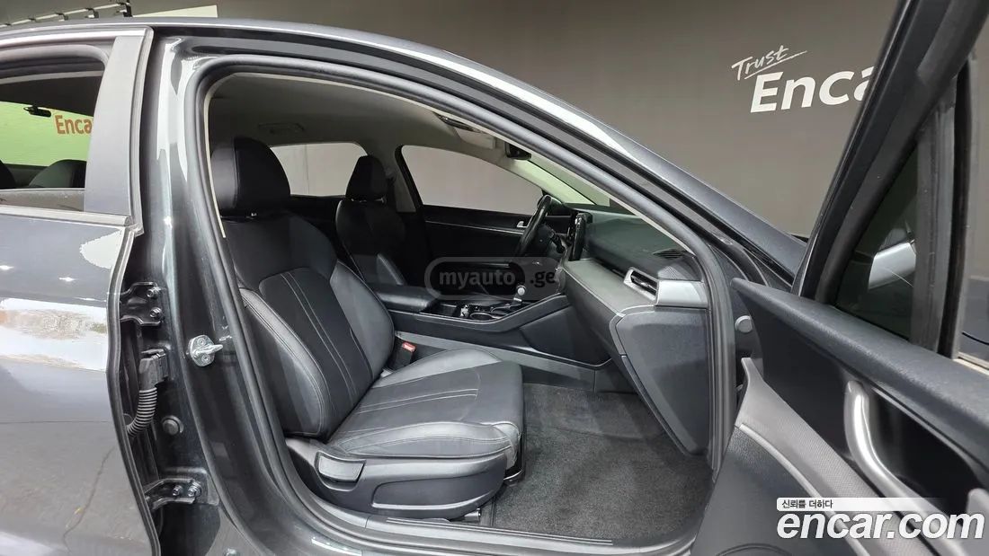 Kia Optima - фото 10