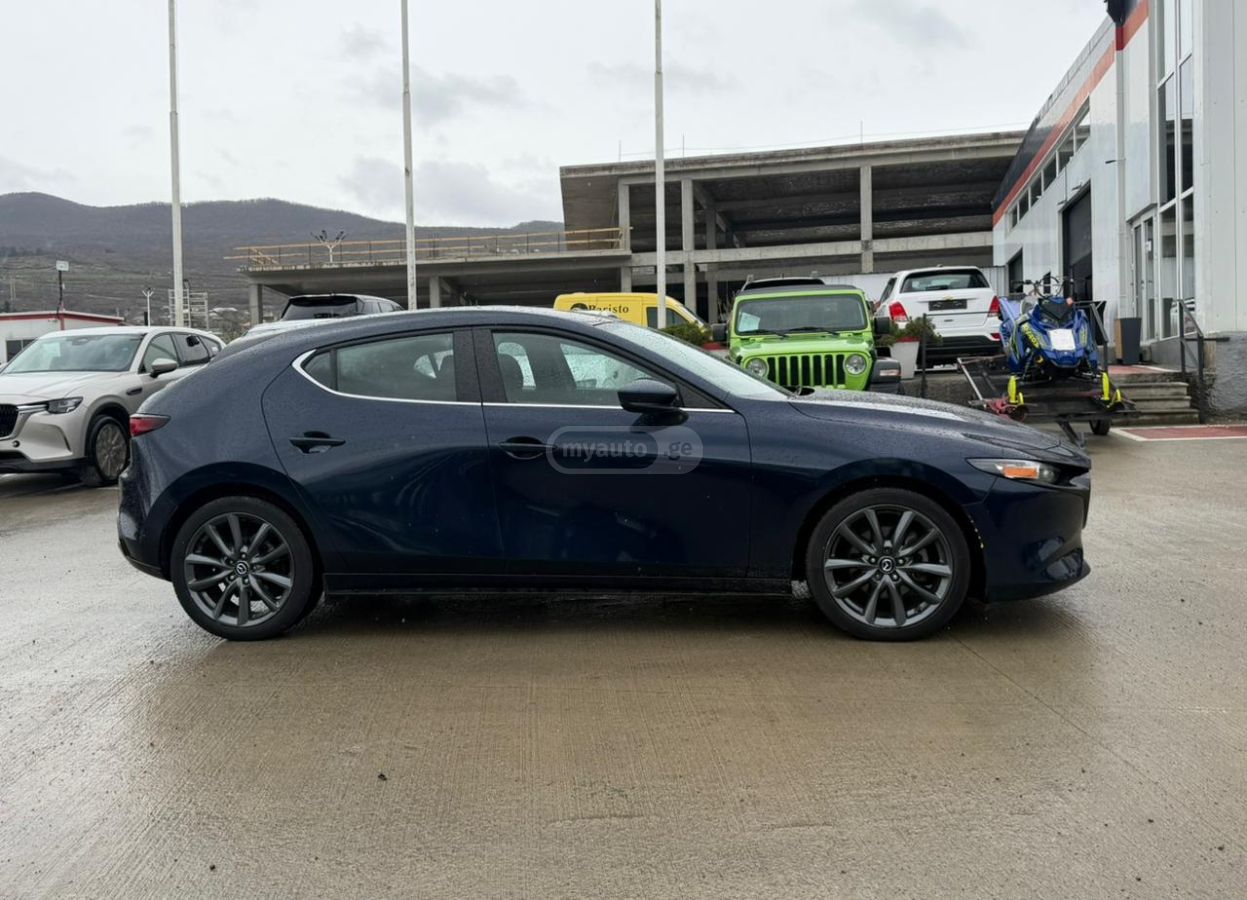 Mazda Mazda 3 - фото 10