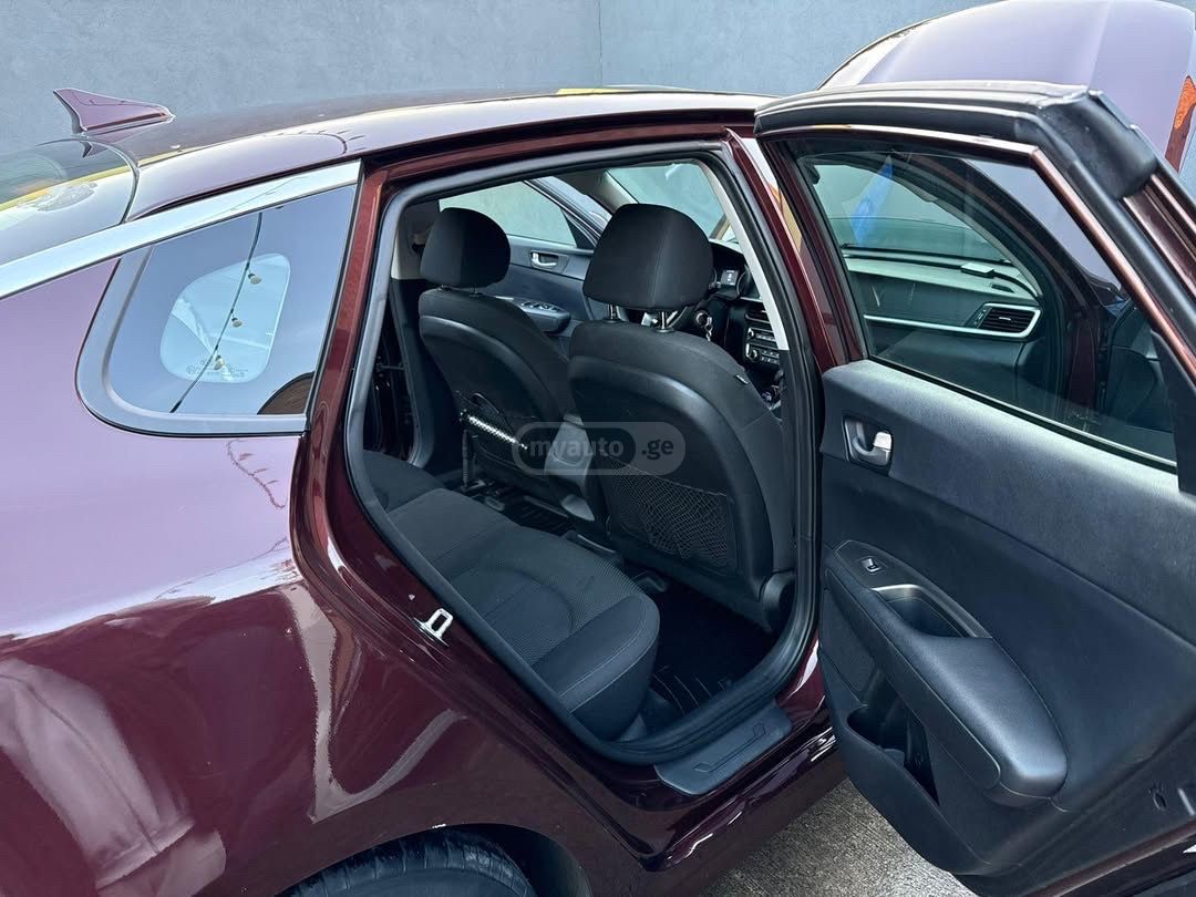 Kia Optima - фото 10
