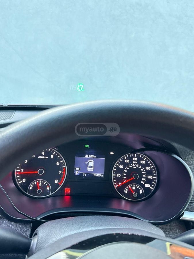 Kia Optima - фото 11