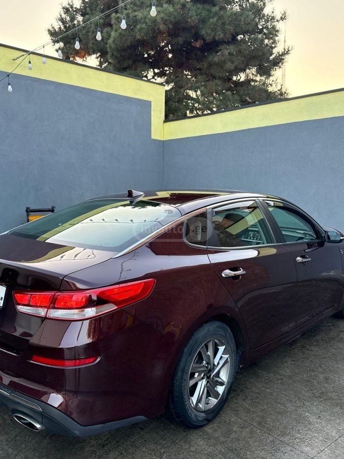 Kia Optima - фото 15