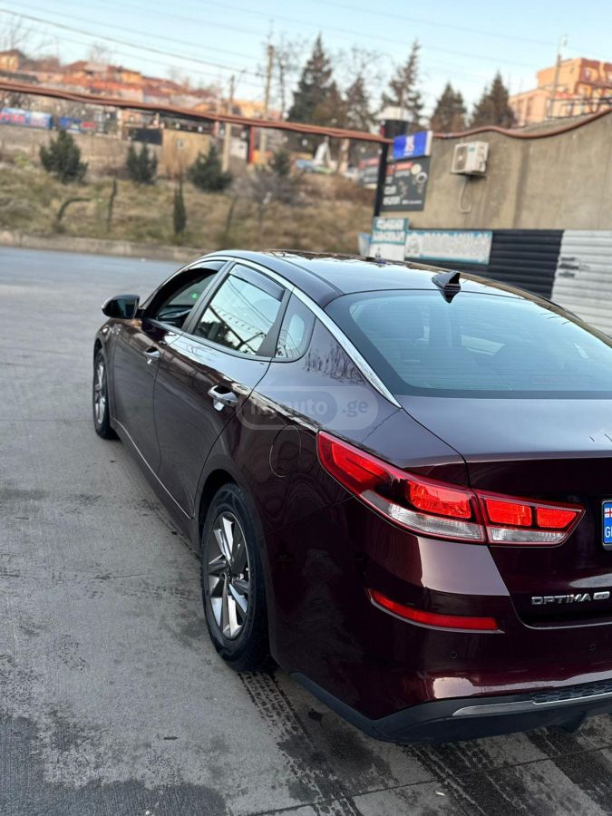 Kia Optima - фото 5