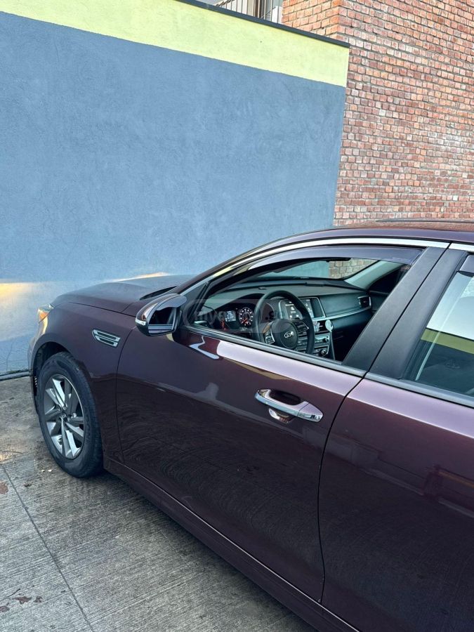 Kia Optima - фото 6