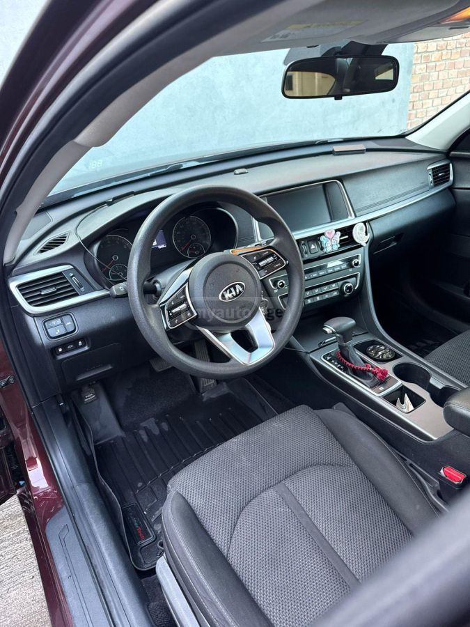 Kia Optima - фото 7