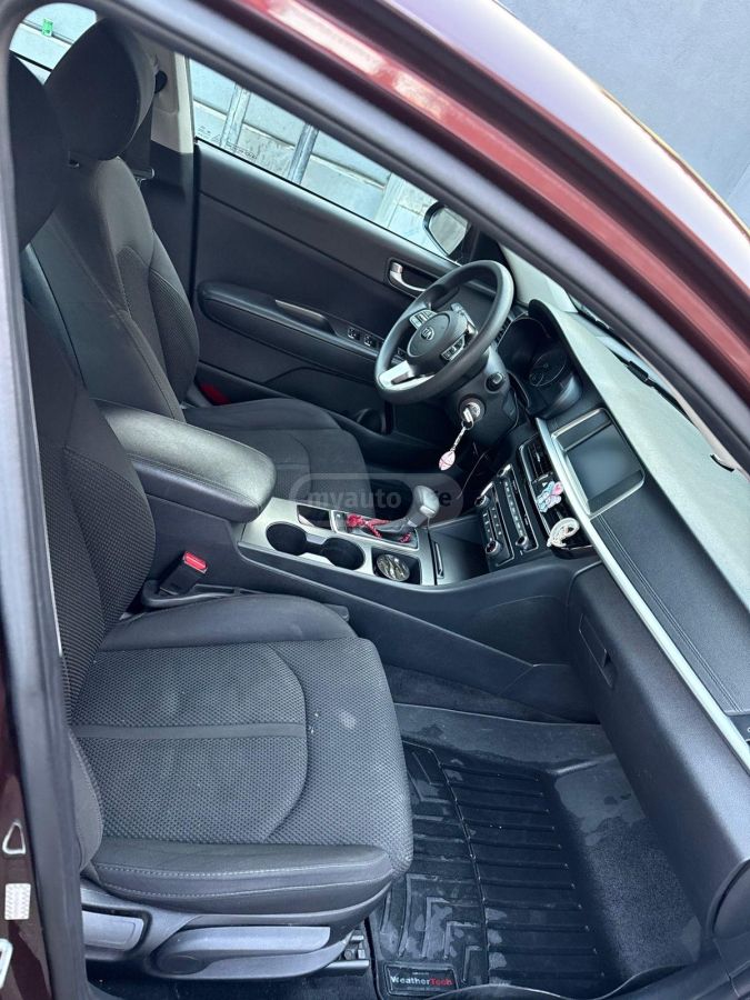 Kia Optima - фото 8