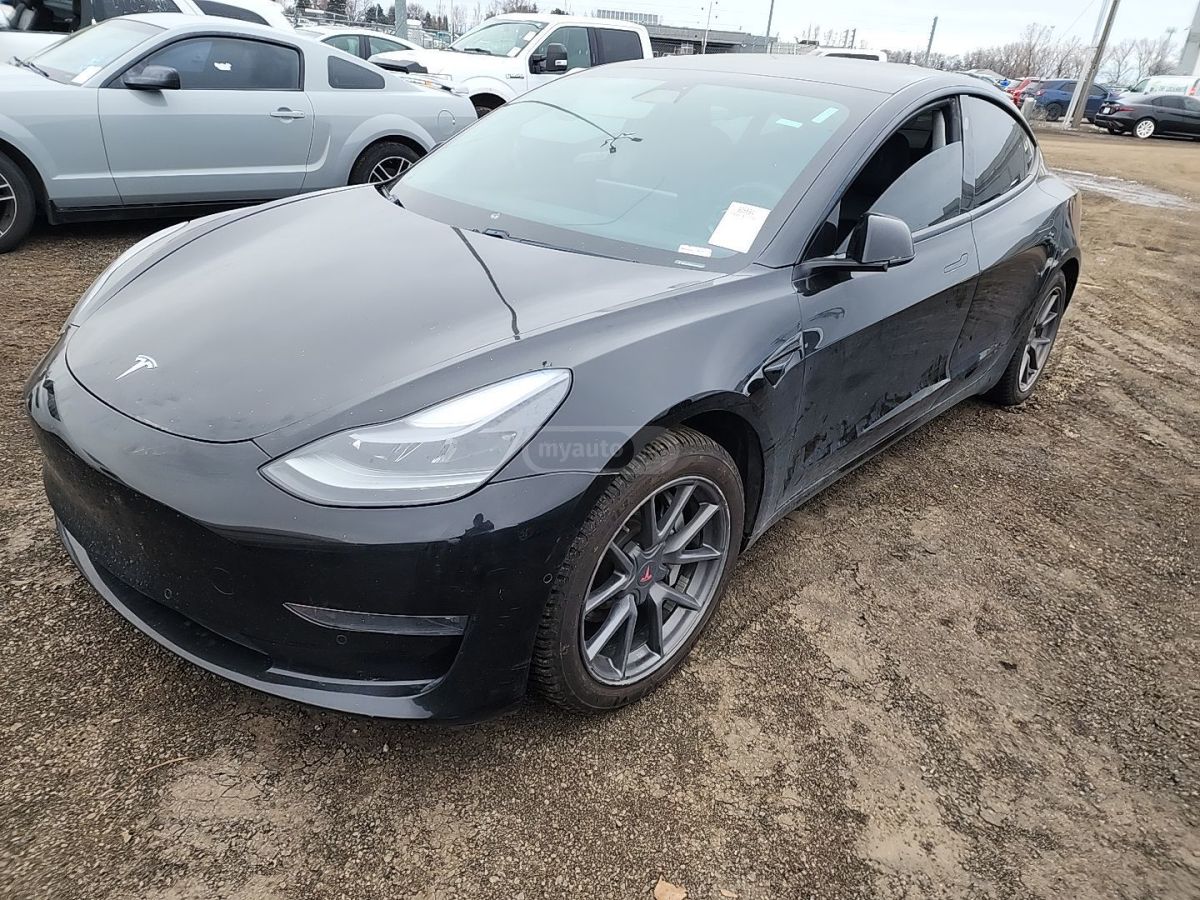 Tesla Model 3 - фото 1