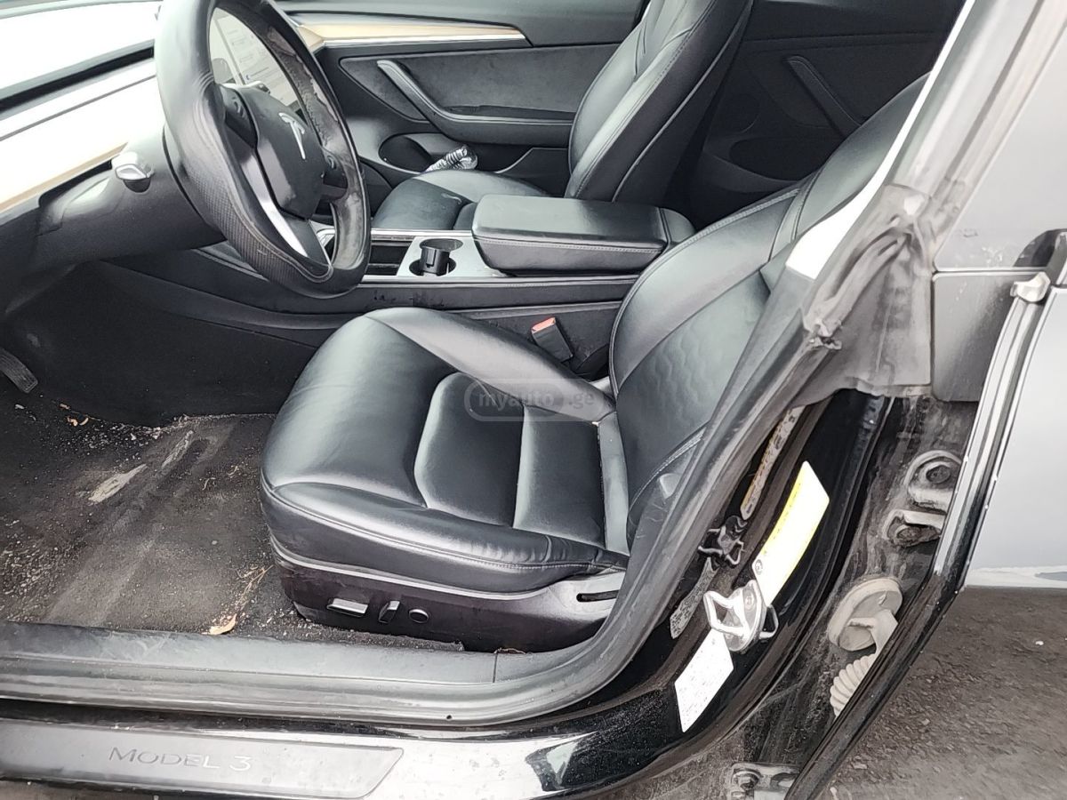 Tesla Model 3 - фото 5