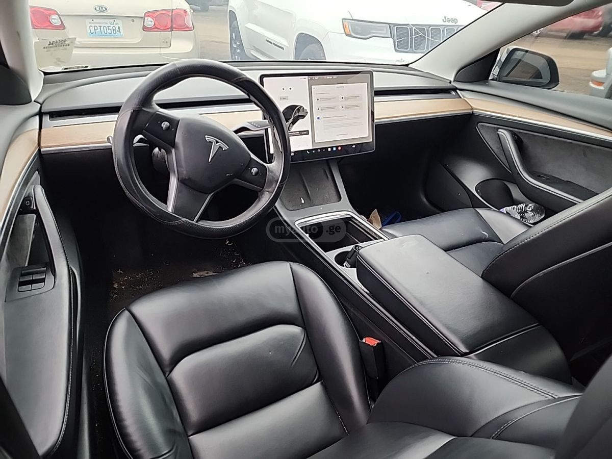 Tesla Model 3 - фото 6